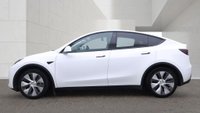 USED 2023 23 TESLA MODEL Y White Dual Motor Long Range SUV, 66,808 miles, Electric 4WD, Leather, Heated seats, Glass roof, Sat nav, Rear camera, Climate control. This 2023 Tesla Model Y Long Range has been kept in excellent condition by its only owner and comes with an MOT valid until March 2027. As an all-electric vehicle with a four-wheel drive system, this model is designed for efficiency and capability. Inside, the cabin is equipped with dual zone climate control and a heated steering wheel for comfort, while passengers in the back benefit from heated seats. The interior experience is enhanced by an expansive glass roof that offers ultraviolet and in