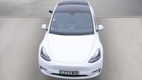 USED 2023 23 TESLA MODEL Y White Dual Motor Long Range SUV, 66,808 miles, Electric 4WD, Leather, Heated seats, Glass roof, Sat nav, Rear camera, Climate control. This 2023 Tesla Model Y Long Range has been kept in excellent condition by its only owner and comes with an MOT valid until March 2027. As an all-electric vehicle with a four-wheel drive system, this model is designed for efficiency and capability. Inside, the cabin is equipped with dual zone climate control and a heated steering wheel for comfort, while passengers in the back benefit from heated seats. The interior experience is enhanced by an expansive glass roof that offers ultraviolet and in