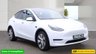 USED 2023 23 TESLA MODEL Y White Dual Motor Long Range SUV, 66,808 miles, Electric 4WD, Leather, Heated seats, Glass roof, Sat nav, Rear camera, Climate control. This 2023 Tesla Model Y Long Range has been kept in excellent condition by its only owner and comes with an MOT valid until March 2027. As an all-electric vehicle with a four-wheel drive system, this model is designed for efficiency and capability. Inside, the cabin is equipped with dual zone climate control and a heated steering wheel for comfort, while passengers in the back benefit from heated seats. The interior experience is enhanced by an expansive glass roof that offers ultraviolet and in