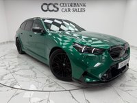 USED 2025 25 BMW M5 4.4 22.1kWh Touring 5dr Petrol Plug-in Hybrid Steptronic xDrive Euro 6 (s/s) (727 ps) Finished In Metalic Isle Of Man Green, This M5 Comes With The Driving Assistant Pro Package, Glass Panoramic Roof, Comfort Package, 20 & 21" M Light Alloy Wheels,  With Sport Tyres, Anthracite Alacantra Headlining, Towbar, M Carbon Side Mirror Caps, Adaptive LED Headlights, BMW Iconic Glow Exterior Pack, M Multifunction Seat, M Multifunction Seat, Front And Rear Heated Seats,CT Front Splitter Carbon Rear Diffuser, Parking Assistance System Plus, Bowers And Wilkins Surround Sound System.