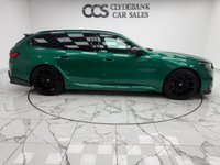 USED 2025 25 BMW M5 4.4 22.1kWh Touring 5dr Petrol Plug-in Hybrid Steptronic xDrive Euro 6 (s/s) (727 ps) Finished In Metalic Isle Of Man Green, This M5 Comes With The Driving Assistant Pro Package, Glass Panoramic Roof, Comfort Package, 20 & 21" M Light Alloy Wheels,  With Sport Tyres, Anthracite Alacantra Headlining, Towbar, M Carbon Side Mirror Caps, Adaptive LED Headlights, BMW Iconic Glow Exterior Pack, M Multifunction Seat, M Multifunction Seat, Front And Rear Heated Seats,CT Front Splitter Carbon Rear Diffuser, Parking Assistance System Plus, Bowers And Wilkins Surround Sound System.