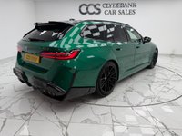 USED 2025 25 BMW M5 4.4 22.1kWh Touring 5dr Petrol Plug-in Hybrid Steptronic xDrive Euro 6 (s/s) (727 ps) Finished In Metalic Isle Of Man Green, This M5 Comes With The Driving Assistant Pro Package, Glass Panoramic Roof, Comfort Package, 20 & 21" M Light Alloy Wheels,  With Sport Tyres, Anthracite Alacantra Headlining, Towbar, M Carbon Side Mirror Caps, Adaptive LED Headlights, BMW Iconic Glow Exterior Pack, M Multifunction Seat, M Multifunction Seat, Front And Rear Heated Seats,CT Front Splitter Carbon Rear Diffuser, Parking Assistance System Plus, Bowers And Wilkins Surround Sound System.