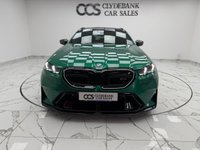 USED 2025 25 BMW M5 4.4 22.1kWh Touring 5dr Petrol Plug-in Hybrid Steptronic xDrive Euro 6 (s/s) (727 ps) Finished In Metalic Isle Of Man Green, This M5 Comes With The Driving Assistant Pro Package, Glass Panoramic Roof, Comfort Package, 20 & 21" M Light Alloy Wheels,  With Sport Tyres, Anthracite Alacantra Headlining, Towbar, M Carbon Side Mirror Caps, Adaptive LED Headlights, BMW Iconic Glow Exterior Pack, M Multifunction Seat, M Multifunction Seat, Front And Rear Heated Seats,CT Front Splitter Carbon Rear Diffuser, Parking Assistance System Plus, Bowers And Wilkins Surround Sound System.