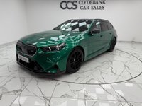 USED 2025 25 BMW M5 4.4 22.1kWh Touring 5dr Petrol Plug-in Hybrid Steptronic xDrive Euro 6 (s/s) (727 ps) Finished In Metalic Isle Of Man Green, This M5 Comes With The Driving Assistant Pro Package, Glass Panoramic Roof, Comfort Package, 20 & 21" M Light Alloy Wheels,  With Sport Tyres, Anthracite Alacantra Headlining, Towbar, M Carbon Side Mirror Caps, Adaptive LED Headlights, BMW Iconic Glow Exterior Pack, M Multifunction Seat, M Multifunction Seat, Front And Rear Heated Seats,CT Front Splitter Carbon Rear Diffuser, Parking Assistance System Plus, Bowers And Wilkins Surround Sound System.
