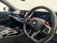 USED 2025 25 BMW M5 4.4 22.1kWh Touring 5dr Petrol Plug-in Hybrid Steptronic xDrive Euro 6 (s/s) (727 ps) Finished In Metalic Isle Of Man Green, This M5 Comes With The Driving Assistant Pro Package, Glass Panoramic Roof, Comfort Package, 20 & 21" M Light Alloy Wheels,  With Sport Tyres, Anthracite Alacantra Headlining, Towbar, M Carbon Side Mirror Caps, Adaptive LED Headlights, BMW Iconic Glow Exterior Pack, M Multifunction Seat, M Multifunction Seat, Front And Rear Heated Seats,CT Front Splitter Carbon Rear Diffuser, Parking Assistance System Plus, Bowers And Wilkins Surround Sound System.