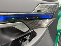 USED 2025 25 BMW M5 4.4 22.1kWh Touring 5dr Petrol Plug-in Hybrid Steptronic xDrive Euro 6 (s/s) (727 ps) Finished In Metalic Isle Of Man Green, This M5 Comes With The Driving Assistant Pro Package, Glass Panoramic Roof, Comfort Package, 20 & 21" M Light Alloy Wheels,  With Sport Tyres, Anthracite Alacantra Headlining, Towbar, M Carbon Side Mirror Caps, Adaptive LED Headlights, BMW Iconic Glow Exterior Pack, M Multifunction Seat, M Multifunction Seat, Front And Rear Heated Seats,CT Front Splitter Carbon Rear Diffuser, Parking Assistance System Plus, Bowers And Wilkins Surround Sound System.