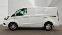 USED 2021 FORD TRANSIT CUSTOM L1 H1 Limited Tdci 130 PS SWB With Air Conditioning, Factory Fitted Sat Nav- Electric Pack, Heated Screen, Parking sensors, Internal Racking in great condition . 1 Owner from new - 2 Keys - 5 Main Dealer Service stamps in the book . This Ford Custom L1 H1 Limited in the short wheelbase configuration is now available for sale. Powered by the reliable 130 PS TDCi diesel engine, this van has had just one owner from new and comes complete with two keys and a fully stamped main dealer service book containing five services.  The specification is exceptionally high. Air conditioning is fitted as standard, alongside a factory-fitted satellite navigation system. The Electric Pack provides convenience at the touch of a button, while the heated front screen ensures clear visibility during cold mornings. Front and rear parking sensors make manoeuvring in tight spaces straightforward and stress-free.  Inside the load area, the van benefits from internal racking that is in great condition, offering practical storage solutions for tools and equipment without the need for aftermarket installation. The bodywork and interior are both presented to a very high standard, reflecting the care taken by its sole previous owner. 