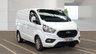 USED 2021 FORD TRANSIT CUSTOM L1 H1 Limited Tdci 130 PS SWB With Air Conditioning, Factory Fitted Sat Nav- Electric Pack, Heated Screen, Parking sensors, Internal Racking in great condition . 1 Owner from new - 2 Keys - 5 Main Dealer Service stamps in the book . This Ford Custom L1 H1 Limited in the short wheelbase configuration is now available for sale. Powered by the reliable 130 PS TDCi diesel engine, this van has had just one owner from new and comes complete with two keys and a fully stamped main dealer service book containing five services.  The specification is exceptionally high. Air conditioning is fitted as standard, alongside a factory-fitted satellite navigation system. The Electric Pack provides convenience at the touch of a button, while the heated front screen ensures clear visibility during cold mornings. Front and rear parking sensors make manoeuvring in tight spaces straightforward and stress-free.  Inside the load area, the van benefits from internal racking that is in great condition, offering practical storage solutions for tools and equipment without the need for aftermarket installation. The bodywork and interior are both presented to a very high standard, reflecting the care taken by its sole previous owner. 