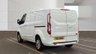 USED 2021 FORD TRANSIT CUSTOM L1 H1 Limited Tdci 130 PS SWB With Air Conditioning, Factory Fitted Sat Nav- Electric Pack, Heated Screen, Parking sensors, Internal Racking in great condition . 1 Owner from new - 2 Keys - 5 Main Dealer Service stamps in the book . This Ford Custom L1 H1 Limited in the short wheelbase configuration is now available for sale. Powered by the reliable 130 PS TDCi diesel engine, this van has had just one owner from new and comes complete with two keys and a fully stamped main dealer service book containing five services.  The specification is exceptionally high. Air conditioning is fitted as standard, alongside a factory-fitted satellite navigation system. The Electric Pack provides convenience at the touch of a button, while the heated front screen ensures clear visibility during cold mornings. Front and rear parking sensors make manoeuvring in tight spaces straightforward and stress-free.  Inside the load area, the van benefits from internal racking that is in great condition, offering practical storage solutions for tools and equipment without the need for aftermarket installation. The bodywork and interior are both presented to a very high standard, reflecting the care taken by its sole previous owner. 