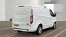 USED 2021 FORD TRANSIT CUSTOM L1 H1 Limited Tdci 130 PS SWB With Air Conditioning, Factory Fitted Sat Nav- Electric Pack, Heated Screen, Parking sensors, Internal Racking in great condition . 1 Owner from new - 2 Keys - 5 Main Dealer Service stamps in the book . This Ford Custom L1 H1 Limited in the short wheelbase configuration is now available for sale. Powered by the reliable 130 PS TDCi diesel engine, this van has had just one owner from new and comes complete with two keys and a fully stamped main dealer service book containing five services.  The specification is exceptionally high. Air conditioning is fitted as standard, alongside a factory-fitted satellite navigation system. The Electric Pack provides convenience at the touch of a button, while the heated front screen ensures clear visibility during cold mornings. Front and rear parking sensors make manoeuvring in tight spaces straightforward and stress-free.  Inside the load area, the van benefits from internal racking that is in great condition, offering practical storage solutions for tools and equipment without the need for aftermarket installation. The bodywork and interior are both presented to a very high standard, reflecting the care taken by its sole previous owner. 