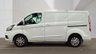 USED 2021 FORD TRANSIT CUSTOM L1 H1 Limited Tdci 130 PS SWB With Air Conditioning, Factory Fitted Sat Nav- Electric Pack, Heated Screen, Parking sensors, Internal Racking in great condition . 1 Owner from new - 2 Keys - 5 Main Dealer Service stamps in the book . This Ford Custom L1 H1 Limited in the short wheelbase configuration is now available for sale. Powered by the reliable 130 PS TDCi diesel engine, this van has had just one owner from new and comes complete with two keys and a fully stamped main dealer service book containing five services.  The specification is exceptionally high. Air conditioning is fitted as standard, alongside a factory-fitted satellite navigation system. The Electric Pack provides convenience at the touch of a button, while the heated front screen ensures clear visibility during cold mornings. Front and rear parking sensors make manoeuvring in tight spaces straightforward and stress-free.  Inside the load area, the van benefits from internal racking that is in great condition, offering practical storage solutions for tools and equipment without the need for aftermarket installation. The bodywork and interior are both presented to a very high standard, reflecting the care taken by its sole previous owner. 