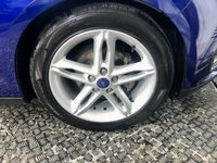 USED 2015 65 FORD FOCUS 1.5 TDCi Titanium Estate 5dr Diesel Powershift Euro 6 (s/s) (120 ps) A stunning example of this Ulez compliant 5 door diesel automatic estate finished in Deep Impact Blue complimented with 17" 5 twin spoke alloys .This car comes with full service history inc cam belt change  9/12 /25 . It comes equipped with rear parking sensors with reverse camera ,cruise control and speed limiter ,Dab cd radio with usb inputs ,touch screen satellite navigation ,auto lights and wipers ,dual zone digital climate control ,Bluetooth connectivity plus all the usual refinements and s