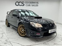 USED 2006 55 SUBARU IMPREZA 2.5 WRX STI Type UK Saloon 4dr Petrol Manual (257 g/km, 278 bhp) Finished In Obsidian Black, This Imprreza Comes With STI Embossed Red Stitching, Forged Engine Rebuild In 2024 With New Timing Belt And Water Pump Invoice Total Over 9k, 18" 10 Spoke Alloy Wheels With Orange Brake Callipers, STI Floor Mats, Service History, 2 Keys, 12 Months MOT, 3 Months Warranty. Finance And Extended Warranty Available.