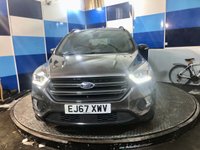 USED 2017 67 FORD KUGA 1.5 TDCi ST-Line SUV 5dr Diesel Powershift Euro 6 (s/s) (120 ps) A  stunning example of this very highly regarded Euro 6 diesel automatic Suv finished in Magnetic Grey complimented with 18" Diamond cut alloys . This vehicle comes with full service history and comes equipped with Ford Sync voice control ,cruise control and speed limiter ,dual zone digital climate control ,front and rear parking sensors with self park ,half leather alcantara interior , satellite navigation ,Dab cd stereo with usb inputs ,onboard computer ,auto lights and wiper plus all the usua