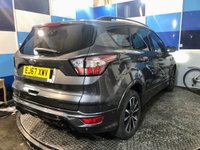 USED 2017 67 FORD KUGA 1.5 TDCi ST-Line SUV 5dr Diesel Powershift Euro 6 (s/s) (120 ps) A  stunning example of this very highly regarded Euro 6 diesel automatic Suv finished in Magnetic Grey complimented with 18" Diamond cut alloys . This vehicle comes with full service history and comes equipped with Ford Sync voice control ,cruise control and speed limiter ,dual zone digital climate control ,front and rear parking sensors with self park ,half leather alcantara interior , satellite navigation ,Dab cd stereo with usb inputs ,onboard computer ,auto lights and wiper plus all the usua