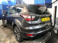 USED 2017 67 FORD KUGA 1.5 TDCi ST-Line SUV 5dr Diesel Powershift Euro 6 (s/s) (120 ps) A  stunning example of this very highly regarded Euro 6 diesel automatic Suv finished in Magnetic Grey complimented with 18" Diamond cut alloys . This vehicle comes with full service history and comes equipped with Ford Sync voice control ,cruise control and speed limiter ,dual zone digital climate control ,front and rear parking sensors with self park ,half leather alcantara interior , satellite navigation ,Dab cd stereo with usb inputs ,onboard computer ,auto lights and wiper plus all the usua