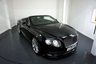 USED 2015 64 BENTLEY CONTINENTAL 6.0 W12 GTC Speed Convertible 2dr Petrol Auto 4WD Euro 5 (625 ps)-Registered Jan 2015-Onyx Black Metallic-Main Hide in Beluga-Linen Contrast Stitching-Speed Logo Stitched to Headrests-Automatic Headlight-Dynamic Range Adjustment-Piano Black Interior Trim-Neck Warmer-Twin Front Armrest-Comfort Sports Equipment-Keyless Entry-Bluetooth-Mfsw-Dual Climate Control-Cruise Control-Lumbar Support to Front Seats-Power Tailgate-Satnav-Rear View Camera-21