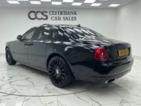 USED 2017 53 ROLLS-ROYCE GHOST 6.6 V12 Saloon 4dr Petrol Auto Euro 6 (563 bhp) Finished In Black, This Rolls Royce Ghost Comes With A Panorama Sunroof, Full Service History, Rear Seat Entertainment With Dual Spirirt Of Ecstasy Rotary Controller, Steering Wheel In Dark Spice, Active Air Suspension, Dynamic LED Headlights, Heads Up Display, 22" Hawk Alloy Wheels With Floating RR Emblem, Reverse And 360 Degree Cameras, Dark Chrome Spirit Of Ecstasy, 4 Zone Climate Control, Front And Rear Heated And Memory Seats, Two Tone Leather In Consort Red/Black.