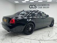 USED 2017 53 ROLLS-ROYCE GHOST 6.6 V12 Saloon 4dr Petrol Auto Euro 6 (563 bhp) Finished In Black, This Rolls Royce Ghost Comes With A Panorama Sunroof, Full Service History, Rear Seat Entertainment With Dual Spirirt Of Ecstasy Rotary Controller, Steering Wheel In Dark Spice, Active Air Suspension, Dynamic LED Headlights, Heads Up Display, 22" Hawk Alloy Wheels With Floating RR Emblem, Reverse And 360 Degree Cameras, Dark Chrome Spirit Of Ecstasy, 4 Zone Climate Control, Front And Rear Heated And Memory Seats, Two Tone Leather In Consort Red/Black.