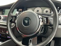 USED 2017 53 ROLLS-ROYCE GHOST 6.6 V12 Saloon 4dr Petrol Auto Euro 6 (563 bhp) Finished In Black, This Rolls Royce Ghost Comes With A Panorama Sunroof, Full Service History, Rear Seat Entertainment With Dual Spirirt Of Ecstasy Rotary Controller, Steering Wheel In Dark Spice, Active Air Suspension, Dynamic LED Headlights, Heads Up Display, 22" Hawk Alloy Wheels With Floating RR Emblem, Reverse And 360 Degree Cameras, Dark Chrome Spirit Of Ecstasy, 4 Zone Climate Control, Front And Rear Heated And Memory Seats, Two Tone Leather In Consort Red/Black.