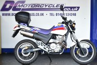 USED 1997 HONDA SLR650 644cc A very hard to find, retro on/off road bike with plenty of power and fun to ride.