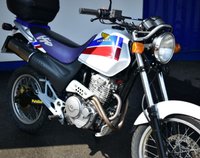 USED 1997 HONDA SLR650 644cc A very hard to find, retro on/off road bike with plenty of power and fun to ride.