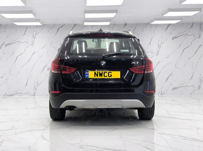 2013 BMW X1 in black — photo 5 of 11