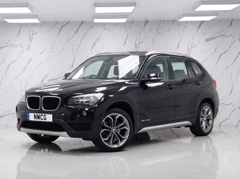 2013 BMW X1 in black — photo 4 of 11