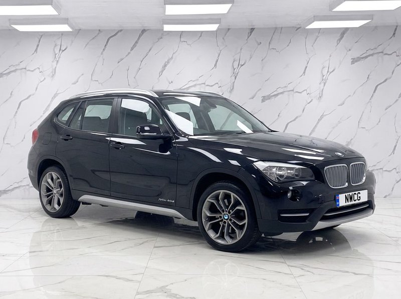 2013 BMW X1 in black — photo 2 of 11