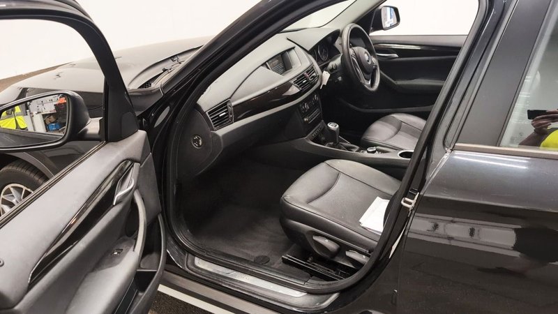 2013 BMW X1 in black — photo 6 of 11