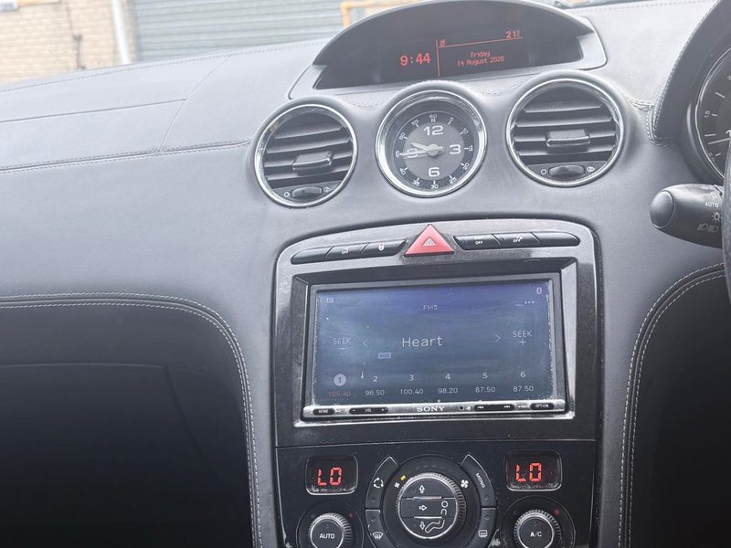 2012 Peugeot RCZ in black — photo 7 of 12