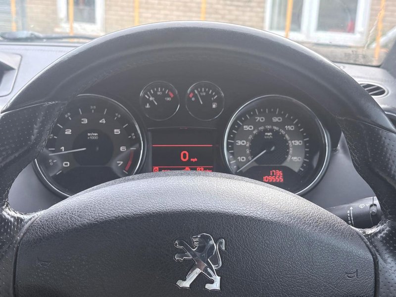 2012 Peugeot RCZ in black — photo 8 of 12