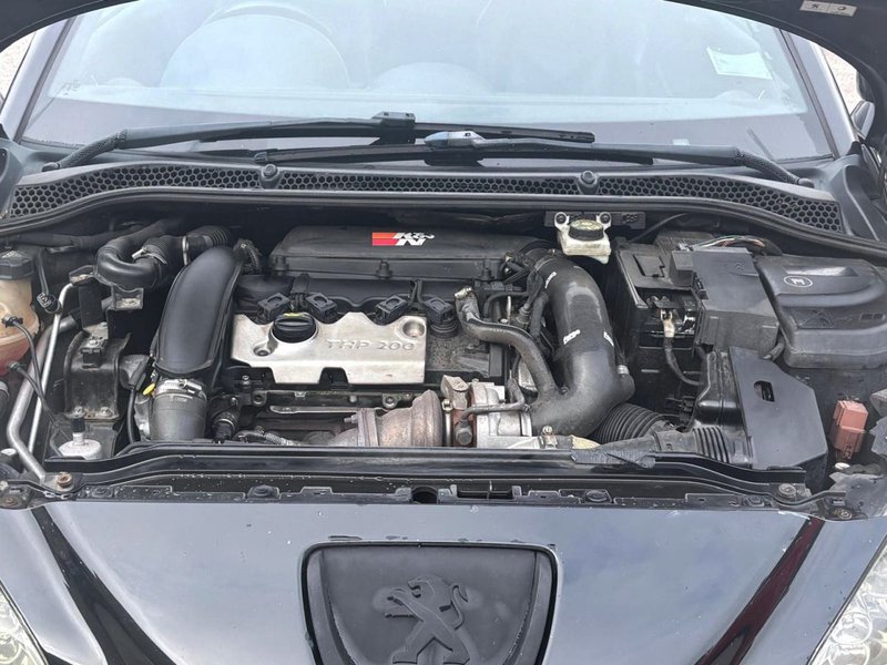 2012 Peugeot RCZ in black — photo 4 of 12