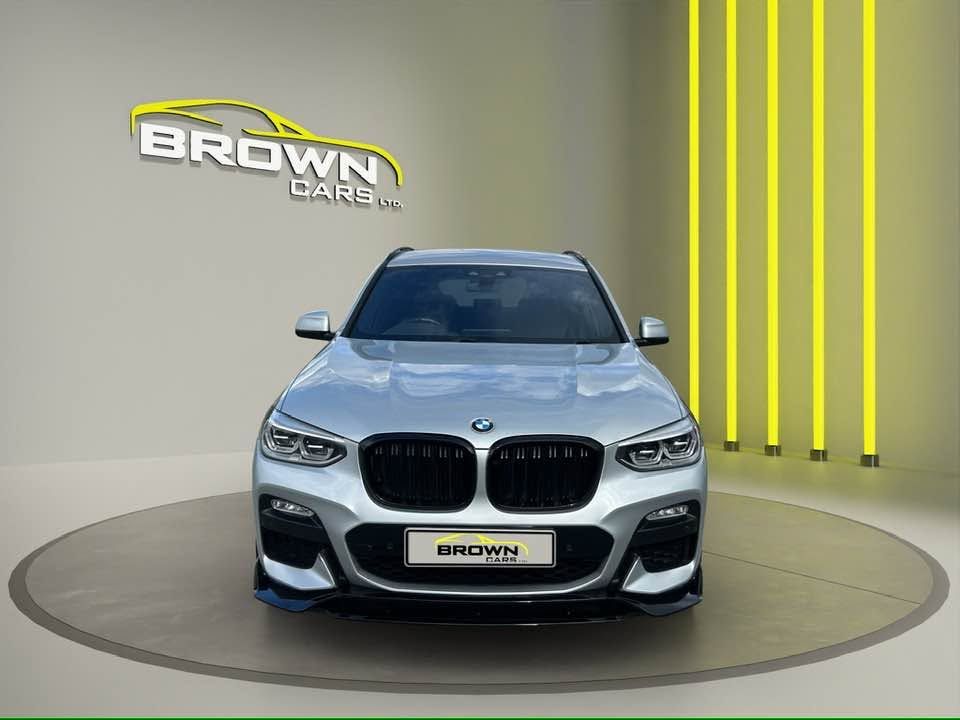 2019 BMW X3 2019 BMW X3 xDrive20d M Sport Auto Finished in Silver | 93000 Miles Key Details: 2.0 Diesel Automatic xDrive Four Wheel Drive M Sport Styling Package Full Body Kit LED Headlights Front & Rear Parking Sensors Cruise Control Dual Zone Climate Control Multifunction Steering Wheel Privacy Glass Spec Includes: Full Leather Interior Heated Front Seats Satellite Navigation Digital Cockpit Bluetooth Connectivity DAB Radio Automatic Lights & Wipers Electric Tailgate USB Connectivity ISOFIX Child Seat Points Alloy Wheels Optional Extra £18995 Finance Available Part Exchange Welcome Fully Prepped & Serviced Brown Cars Ltd, Greenbank Service Station, Warrenpoint Road, Newry Alan: 07511 310707 / 07907 561671 - vehicle photo 2 for sale on PureCar
