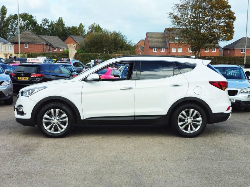 2016 Hyundai Santa Fe in white — photo 14 of 29