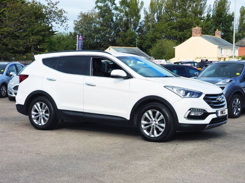 2016 Hyundai Santa Fe in white — photo 2 of 29
