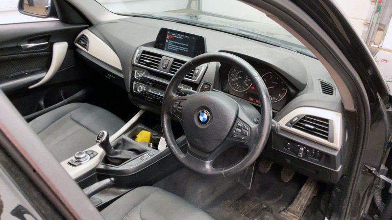 2017 BMW 1 Series in black — photo 8 of 11