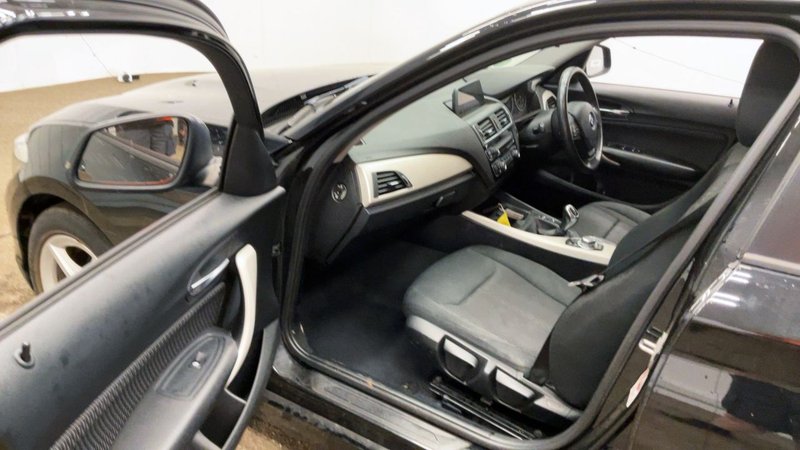 2017 BMW 1 Series in black — photo 6 of 11