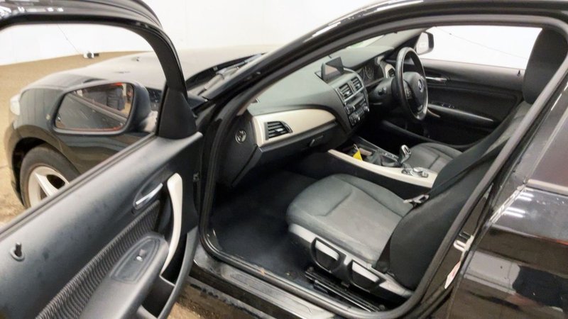 2017 BMW 1 Series in black — photo 11 of 16