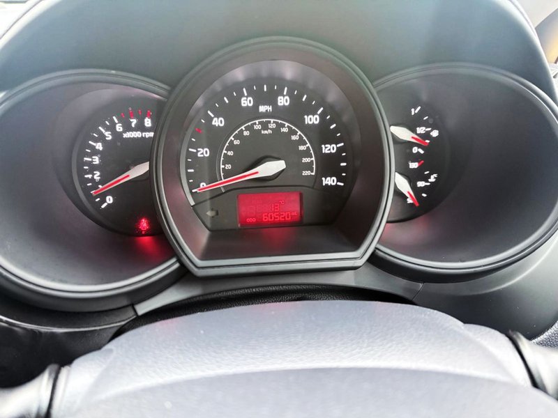 2015 Kia Rio in yellow — photo 15 of 16