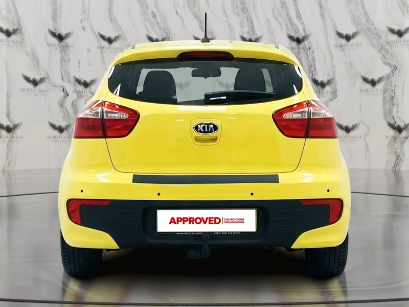 2015 Kia Rio in yellow — photo 5 of 16