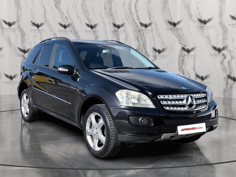 2006 Mercedes-Benz M Class in black — photo 1 of 21