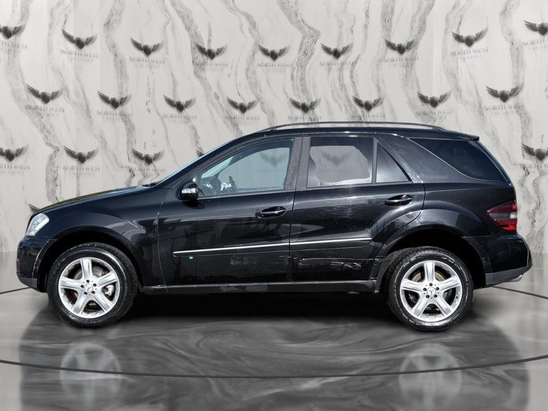 2006 Mercedes-Benz M Class in black — photo 4 of 21