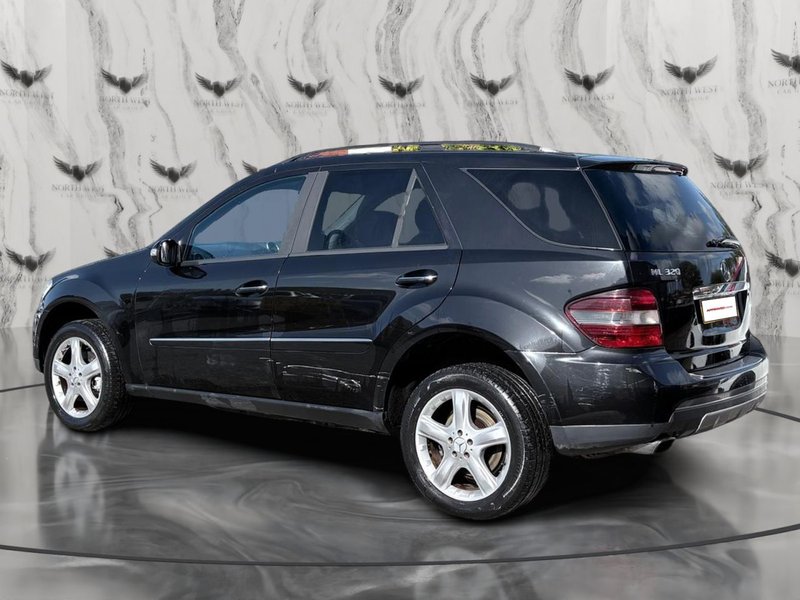 2006 Mercedes-Benz M Class in black — photo 5 of 21