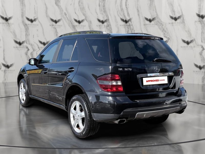 2006 Mercedes-Benz M Class in black — photo 6 of 21