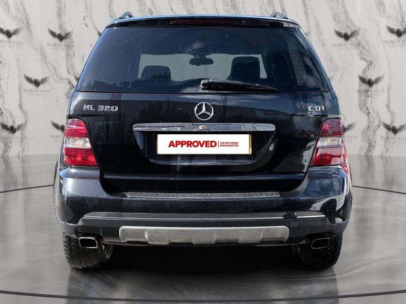 2006 Mercedes-Benz M Class in black — photo 7 of 21