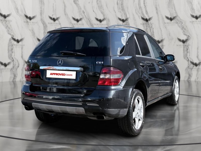 2006 Mercedes-Benz M Class in black — photo 8 of 21