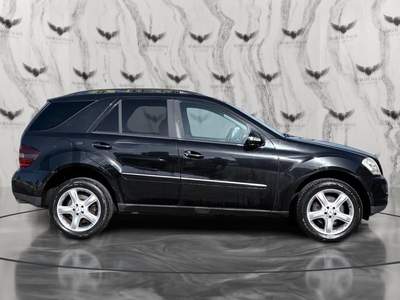 2006 Mercedes-Benz M Class in black — photo 10 of 21