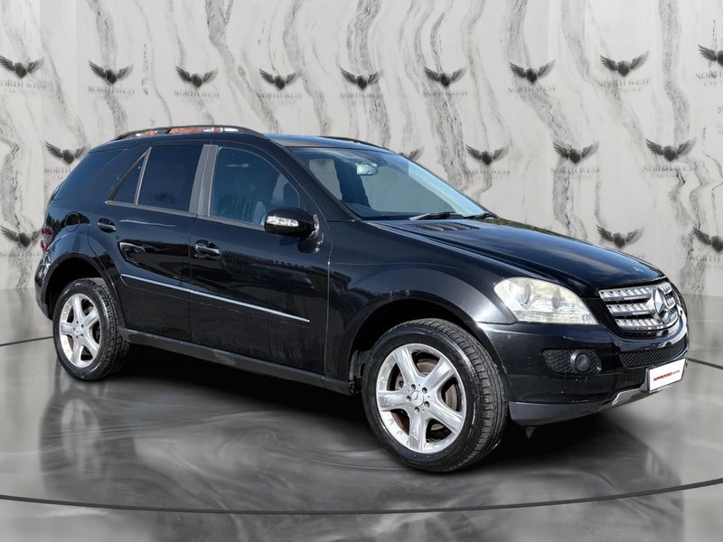 2006 Mercedes-Benz M Class in black — photo 11 of 21