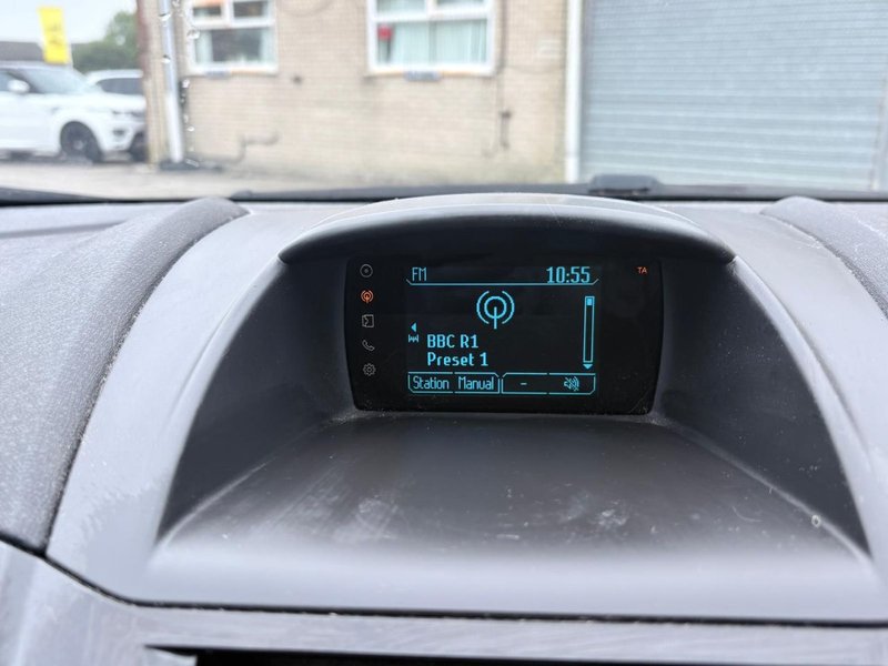 2015 Ford Fiesta in white — photo 13 of 21